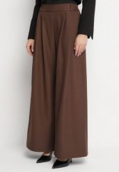 Brązowe Spodnie o Fasonie Palazzo z Wsuwanymi Kieszeniami Adivena. Brązowe spodnie materiałowe damskie Born2be, bez wzorów, z jeansu, eleganckie, z podwyższonym stanem, długie. Za 99.99 zł.