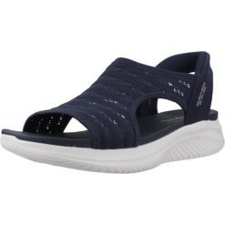 Sandały SKECHERS 119805S Niebieski. Niebieskie sandały damskie Skechers, bez wzorów, z materiału, bez obcasa, bez zapięcia. Za 390.00 zł.