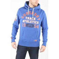 SuperDry Bluza Niebieski. Niebieskie bluzy męskie Superdry, l, bez wzorów, z bawełny, bez ramiączek, bez kaptura. Za 395.95 zł.