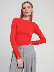 Sweter z ozdobnymi guzikami - pomarańczowy. Brązowe swetry nierozpinane damskie Sinsay, l, bez wzorów, ze skóry, bez kołnierzyka, bez ramiączek. W wyprzedaży za 22.99 zł.