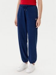 Guess Jeans Spodnie dresowe W5YB65 KCXQ1 Granatowy Regular Fit. Niebieskie spodnie dresowe damskie Guess Jeans, z aplikacjami, z bawełny. Za 269.99 zł.