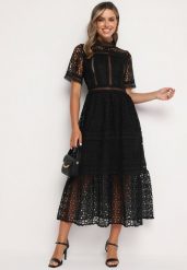 Czarna Maxi Sukienka Rozkloszowana w Ażurowy Wzór z Falbanką Raviletta. Czarne sukienki damskie Born2be, na plażę, na lato, s, w ażurowe wzory, boho, bez kołnierzyka, bez ramiączek, maxi, rozkloszowane. Za 149.99 zł.