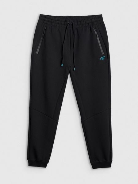 4F Spodnie dresowe joggery męskie - czarne XL. Czarne spodnie materiałowe męskie 4F, bez wzorów, z bawełny. Za 179.99 zł.