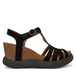 Sandały Fly London. Czarne sandały damskie Fly London, bez wzorów, bez obcasa, na koturnie, bez zapięcia. Za 479.99 zł.