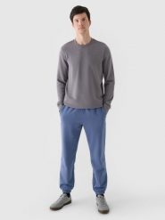 4F Spodnie dresowe joggery męskie - niebieskie M. Niebieskie spodnie materiałowe męskie 4F, bez wzorów, z bawełny. Za 149.99 zł.