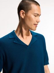Strukturalny sweter polo - niebieski. Niebieskie swetry męskie Reserved, l, bez wzorów, z bawełny, bez kołnierzyka, bez ramiączek. Za 129.99 zł.