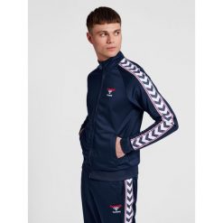 Bluza dresowa zapinana na zamek błyskawiczny Hummel IC Lerby Poly. Niebieskie bluzy męskie Hummel, m, bez wzorów, z dresówki, sportowe, bez ramiączek, bez kaptura. Za 284.00 zł.