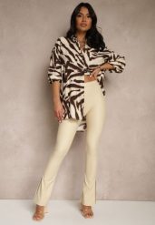 Beżowe Spodnie Dzwony z Ekoskóry High Waist Ellimaya. Brązowe spodnie materiałowe damskie Renee, bez wzorów, z jeansu, eleganckie, z podwyższonym stanem. Za 49.99 zł.