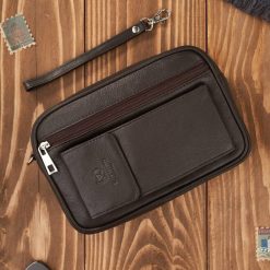 Saszetka męska skórzana do ręki z miejscem na telefon brązowa Paolo Peruzzi T-132-BR. Brązowe saszetki i nerki męskie bez wzorów, z materiału. Za 119.00 zł.