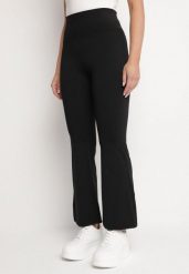 Czarne Legginsy o Kroju Dzwonów z Wysokim Stanem Talliara. Czarne legginsy damskie Born2be, bez wzorów, z jeansu. Za 34.99 zł.