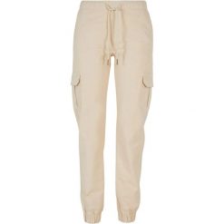 Spodnie Do Biegania Z Kieszenią Cargo Z Wysokimi Stanami Dla Pań I Panów. Brązowe spodnie dresowe damskie Urban Classics, bez wzorów, sportowe, z podwyższonym stanem, długie, do biegania. Za 153.99 zł.