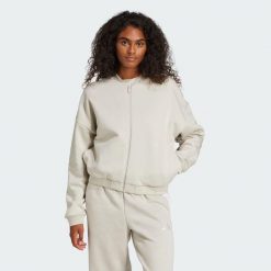 Kurtka Essentials Contemporary Logo Bomber. Brązowe kurtki sportowe damskie Adidas, m, bez wzorów, z bawełny, bez ramiączek, bez kaptura. Za 259.00 zł.