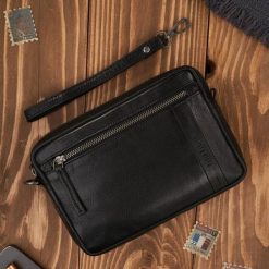Skórzana saszetka męska do ręki z odpinanym paskiem czarna Paolo Peruzzi AL-10-BL. Czarne saszetki i nerki męskie Paolo Peruzzi, bez wzorów. Za 220.72 zł.