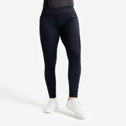 Legginsy jeździeckie damskie ciepłe z silikonowym lejem. Czarne legginsy damskie FOUGANZA, bez wzorów, z materiału. Za 199.99 zł.