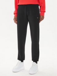 Guess Spodnie dresowe V4YB08 KCAY2 Czarny Regular Fit. Czarne spodnie dresowe damskie Guess, z aplikacjami, z dresówki. Za 239.99 zł.
