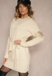Beżowa Sukienka Sweterkowa z Wełną Ozdobiona Cyrkoniami Paskiem i Wycięciami Zolida. Brązowe sukienki damskie Renee, na co dzień, bez wzorów, z wełny, eleganckie, bez kołnierzyka, bez ramiączek, mini, dopasowane. Za 149.99 zł.