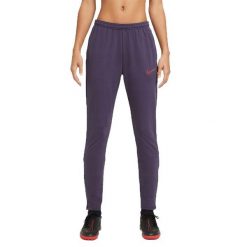 Damskie Spodnie Do Biegania Academy 21 DriFIT. Fioletowe spodnie dresowe damskie Nike, bez wzorów, sportowe, długie, do biegania. Za 191.99 zł.