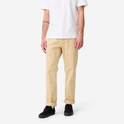 Spodnie chinos na deskorolkę CN500 Heavy beżowe. Brązowe eleganckie spodnie męskie Decathlon, bez wzorów, z bawełny. Za 159.99 zł.