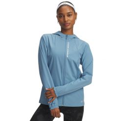 Damska kurtka wodoodporna Under Armour Outrun The Storm. Białe kurtki sportowe damskie Under Armour, m, bez wzorów, z materiału, bez ramiączek, z kapturem, do biegania. Za 580.99 zł.