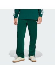 Adidas Spodnie dresowe Firebird KD8317 Zielony Loose Fit. Zielone spodnie sportowe męskie Adidas, l, bez wzorów, z dresówki. Za 279.99 zł.