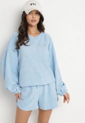 Niebieski Dzianinowy Komplet Bluza i Szorty Novanisa. Niebieskie bluzy damskie Born2be, na lato, bez wzorów, z dzianiny, klasyczne, bez ramiączek, bez kaptura. Za 129.99 zł.