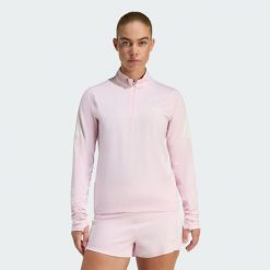 Bluza adi365 Iconic Running 1/2 Zip. Czerwone bluzy damskie Adidas, bez wzorów, sportowe, bez ramiączek, bez kaptura. Za 219.00 zł.