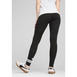 Legginsy damskie z logo No. 1 ESS PUMA Black. Czarne legginsy damskie Puma, bez wzorów, z dżerseju. W wyprzedaży za 94.00 zł.