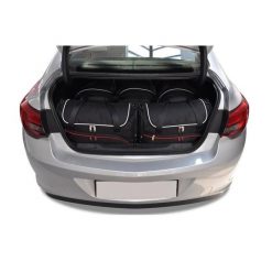 Torby Do Bagażnika Opel Astra Limousine 2012-2015 5Szt Kjust. Czarne torby podróżne damskie KJUST, bez wzorów. Za 1,523.00 zł.