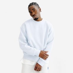 Bluza okrągły dekolt męska Elementals. Niebieskie bluzy męskie Decathlon, m, bez wzorów, z bawełny, casualowe, bez ramiączek, bez kaptura. W wyprzedaży za 119.99 zł.