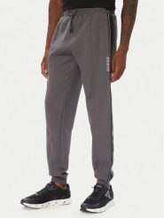 Guess Spodnie dresowe Z2YB09 KB3P2 Szary ciemny Regular Fit. Szare spodnie sportowe męskie Guess, m, z aplikacjami, z dresówki. Za 434.99 zł.