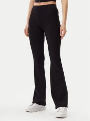 Guess Legginsy V5GB11 KCRS2 Czarny Regular Fit. Czarne legginsy damskie Guess, z aplikacjami, z wiskozy. Za 199.99 zł.