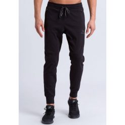 Spodnie dresowe Erima essential. Czarne spodnie sportowe męskie Erima, m, bez wzorów, z dresówki, na fitness i siłownię. Za 195.00 zł.