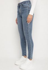 Niebieskie Jeansy o Kroju Skinny z Wysokim Stanem Solarie. Niebieskie spodnie dresowe damskie Born2be, bez wzorów, z bawełny, sportowe. Za 99.99 zł.