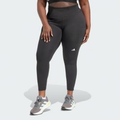 Legginsy Own the Run 7/8 (Plus Size). Czarne legginsy damskie Adidas, bez wzorów, z materiału. Za 279.00 zł.