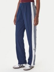 Adidas Spodnie dresowe Adibreak KD6325 Granatowy Loose Fit. Niebieskie spodnie dresowe damskie Adidas, bez wzorów, z dresówki. Za 329.99 zł.