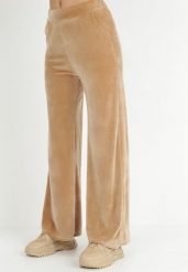 Beżowe Spodnie Dresowe Welurowe Szerokie Colki. Brązowe spodnie dresowe damskie Born2be, bez wzorów, z dresówki, eleganckie, długie. Za 64.99 zł.