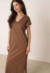 Brązowa Bawełniana Sukienka Pudełkowa o Fasonie Oversize z Kieszeniami Thaelusa. Brązowe sukienki damskie Born2be, na co dzień, l, bez wzorów, z bawełny, bez kołnierzyka, bez ramiączek, maxi, oversize. Za 139.99 zł.
