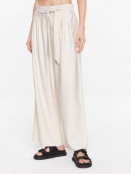 Moss Copenhagen Spodnie materiałowe Joanita 17336 Beżowy Relaxed Fit. Brązowe spodnie materiałowe damskie Moss Copenhagen, bez wzorów, z materiału. Za 329.99 zł.