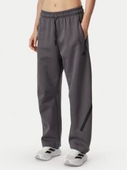 Adidas Spodnie dresowe Z.N.E. Open Hem KF6377 Szary Loose Fit. Szare spodnie dresowe damskie Adidas, bez wzorów, z dresówki. Za 398.99 zł.