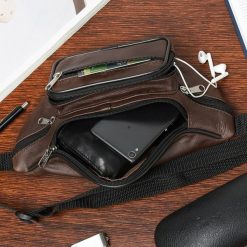 Nerka saszetka skórzana męska klasyczna pojemna biodrówka brązowa I54. Brązowe saszetki i nerki męskie bez wzorów. Za 54.99 zł.