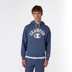 Bluza z kapturem męska Champion. Niebieskie bluzy męskie Champion, m, bez wzorów, z tkaniny, casualowe, bez ramiączek, z kapturem. Za 249.99 zł.
