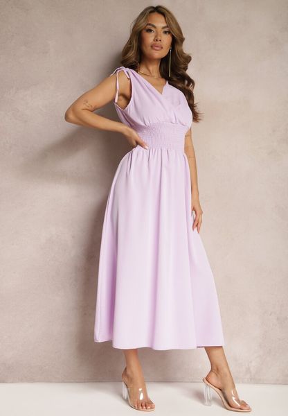 Jasnofioletowa Rozkloszowna Sukienka na Cienkich Ramiączkach z Kopertowym Dekoltem Eilinestia. Fioletowe sukienki damskie Renee, na co dzień, l, bez wzorów, bez kołnierzyka, bez ramiączek, maxi, kopertowe. Za 69.99 zł.