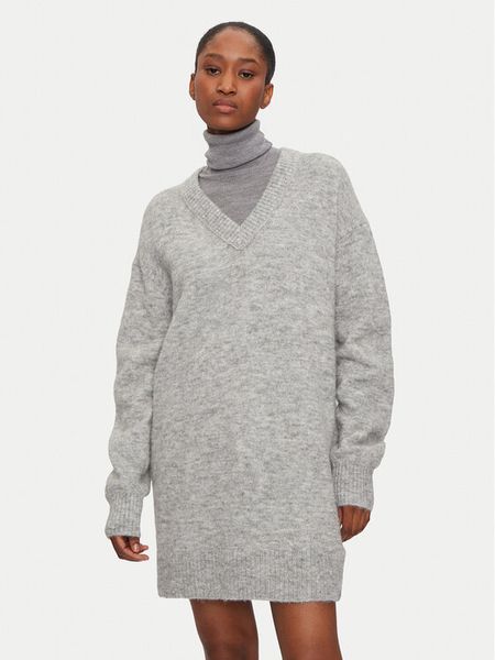 Calvin Klein Jeans Sukienka dzianinowa J20J224638 Szary Loose Fit. Szare sukienki damskie Calvin Klein Jeans, m, bez wzorów, z dzianiny, bez kołnierzyka, bez ramiączek. Za 349.99 zł.