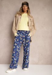 Niebieskie Bawełniane Spodnie Boho w Stylu Palazzo z Gumką w Pasie i Wysokim Stanem Pravia. Niebieskie spodnie materiałowe damskie Renee, bez wzorów, z bawełny, boho, z podwyższonym stanem. Za 39.99 zł.
