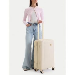 Walizka średnia Nine West. Białe walizki damskie Nine West, bez wzorów, średnie. Za 359.99 zł.