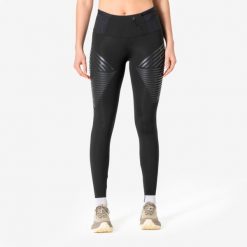 Legginsy do biegania damskie KIPRUN RHEON. Czarne legginsy damskie KIPRUN, bez wzorów, z elastanu. Za 299.99 zł.