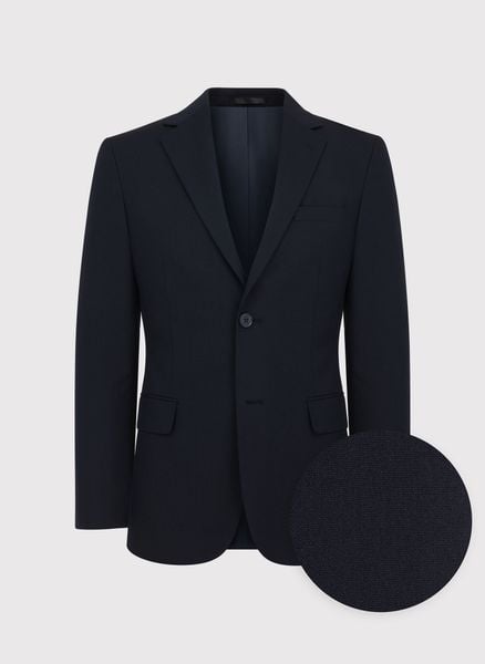 PAKO LORENTE - Gładka granatowa marynarka garniturowa. Garnitury męskie Pako Lorente, bez wzorów, z elastanu, bez kołnierzyka, bez ramiączek. Za 999.99 zł.