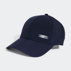 Czapka z daszkiem ADIDAS. Niebieskie czapki damskie Adidas, bez wzorów, z materiału, eleganckie. Za 79.99 zł.