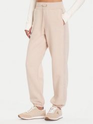 Guess Spodnie dresowe V5BB10 KB681 Beżowy Regular Fit. Brązowe spodnie dresowe damskie Guess, z aplikacjami, z bawełny. Za 299.99 zł.