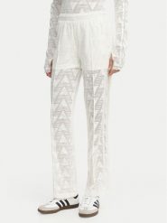 Adidas Spodnie dresowe Firebird Classic KE3455 Écru Regular Fit. Białe spodnie dresowe damskie Adidas, bez wzorów, z dresówki. Za 359.99 zł.